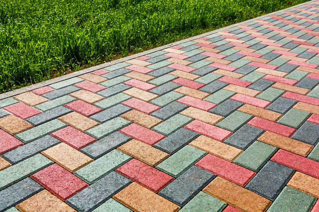 Selective focus on colorful pedestrian concrete pavers. Arranged according to pattern design. Colorful and attractive to pedestrians.